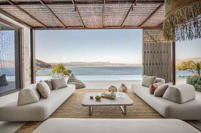 An open-air living room facing the sea